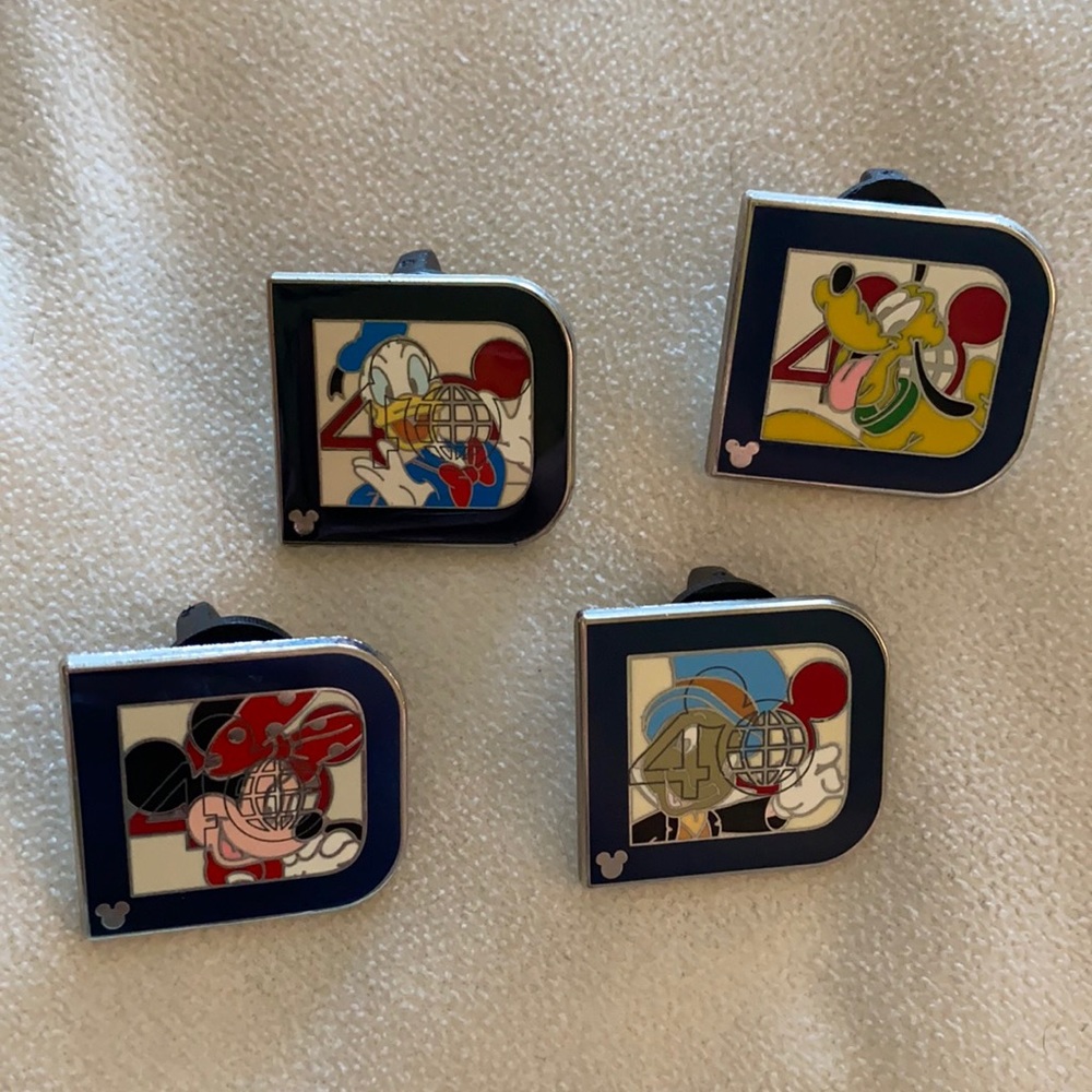 Four Hidden Mickey Disney 40th anniversary pins
